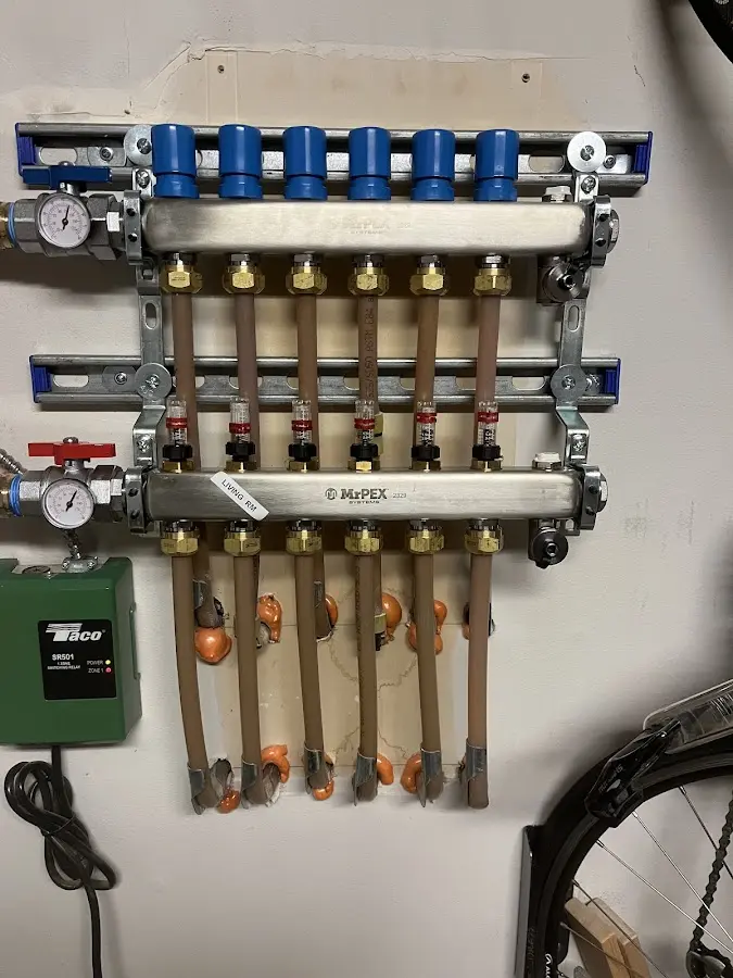 Plumber performing Water Heater Repair at a residential property in Morris